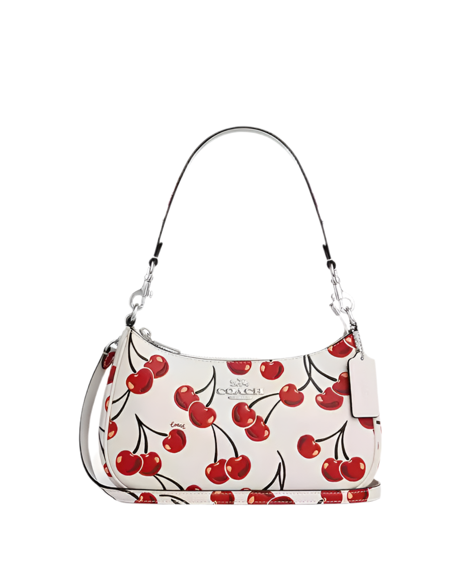 COACH TERI SHOULDER SIGNATURE CANVAS WITH CHERRY PRINT.