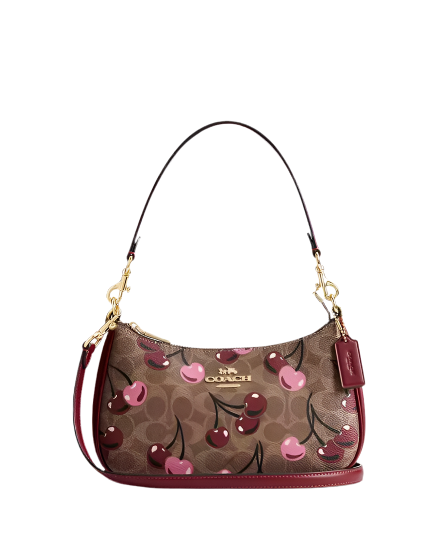COACH TERI SHOULDER SIGNATURE CANVAS WITH CHERRY PRINT.