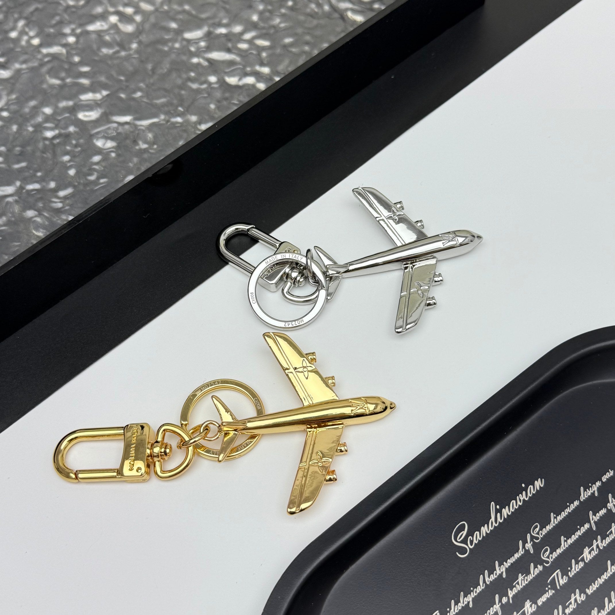 LV PLANE KEY HOLDER & BAG CHARM