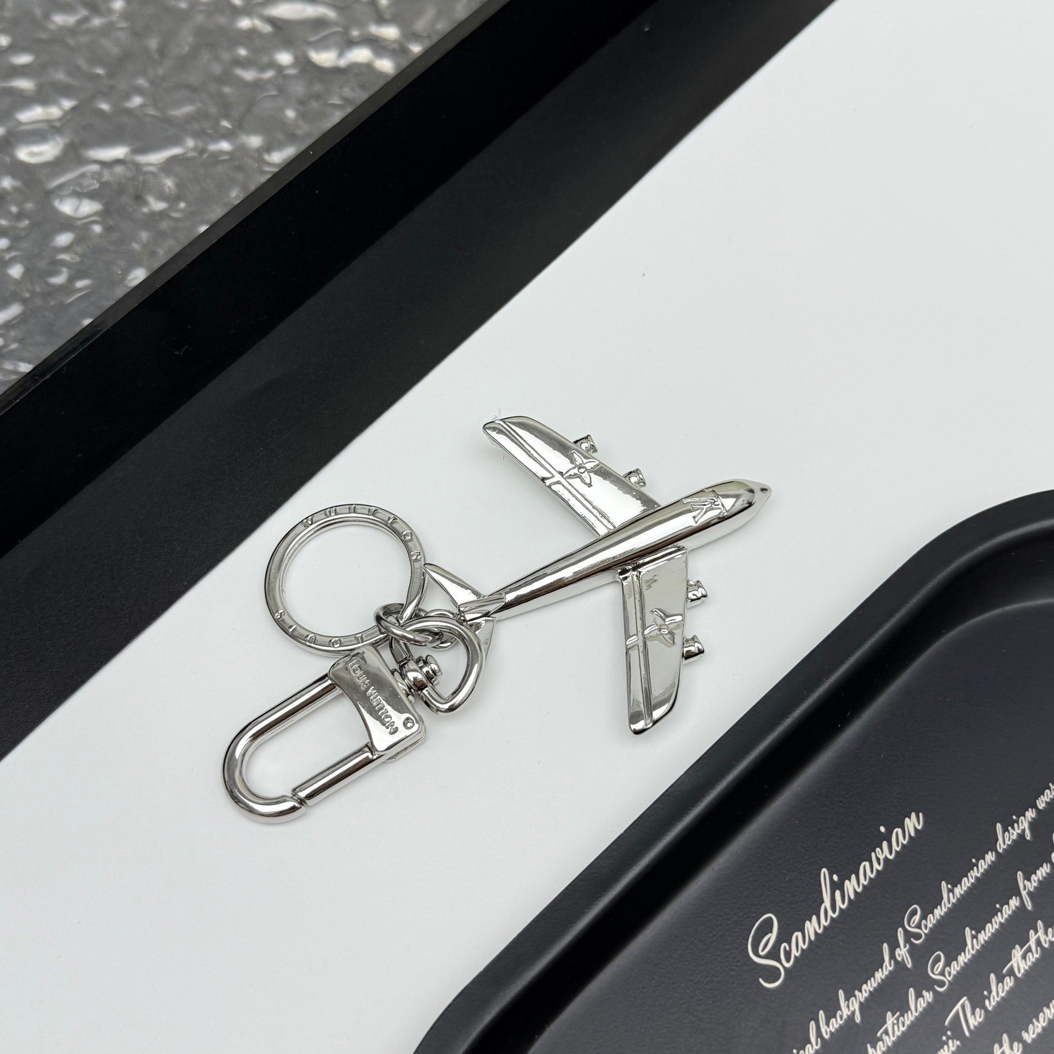LV PLANE KEY HOLDER & BAG CHARM